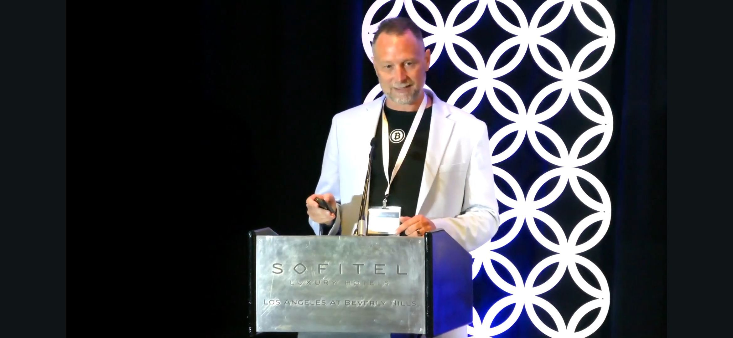 Eric Runge presenting at the Family Office Club event at the Sofitel Los Angeles at Beverly Hills